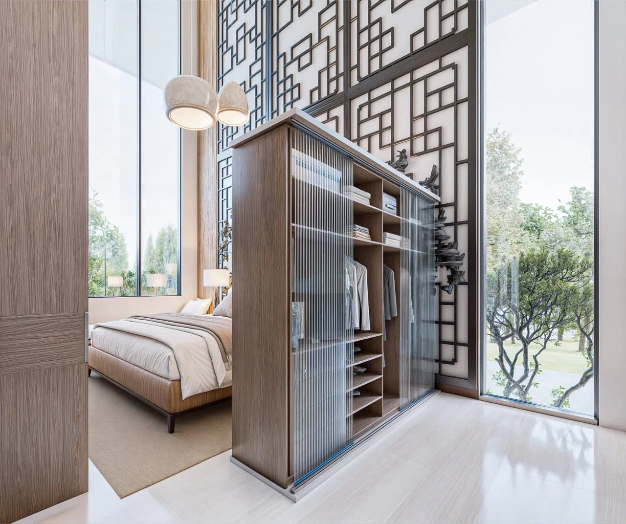 Bedroom with a glazed wardrobe divider and full-height garden windows